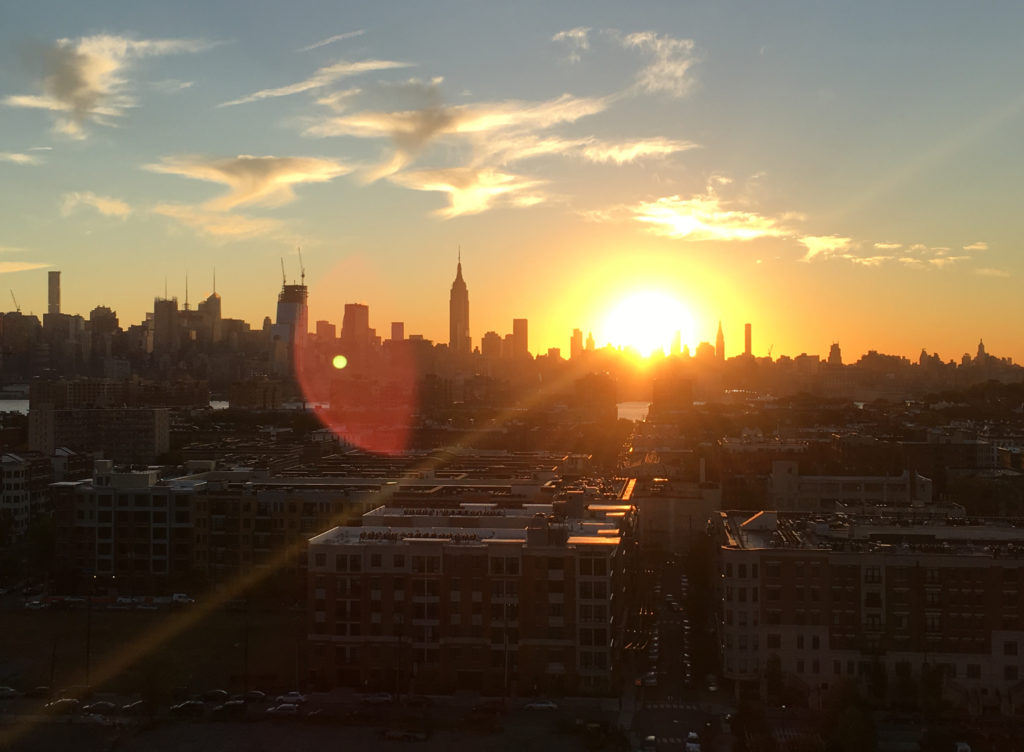 Sunrise of NYC skyline from NJ