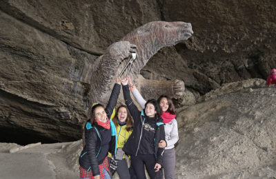 Cueva del Milodón Natural Monument in Torres del Paine, Chile, with new NYC Subway Handle amigas