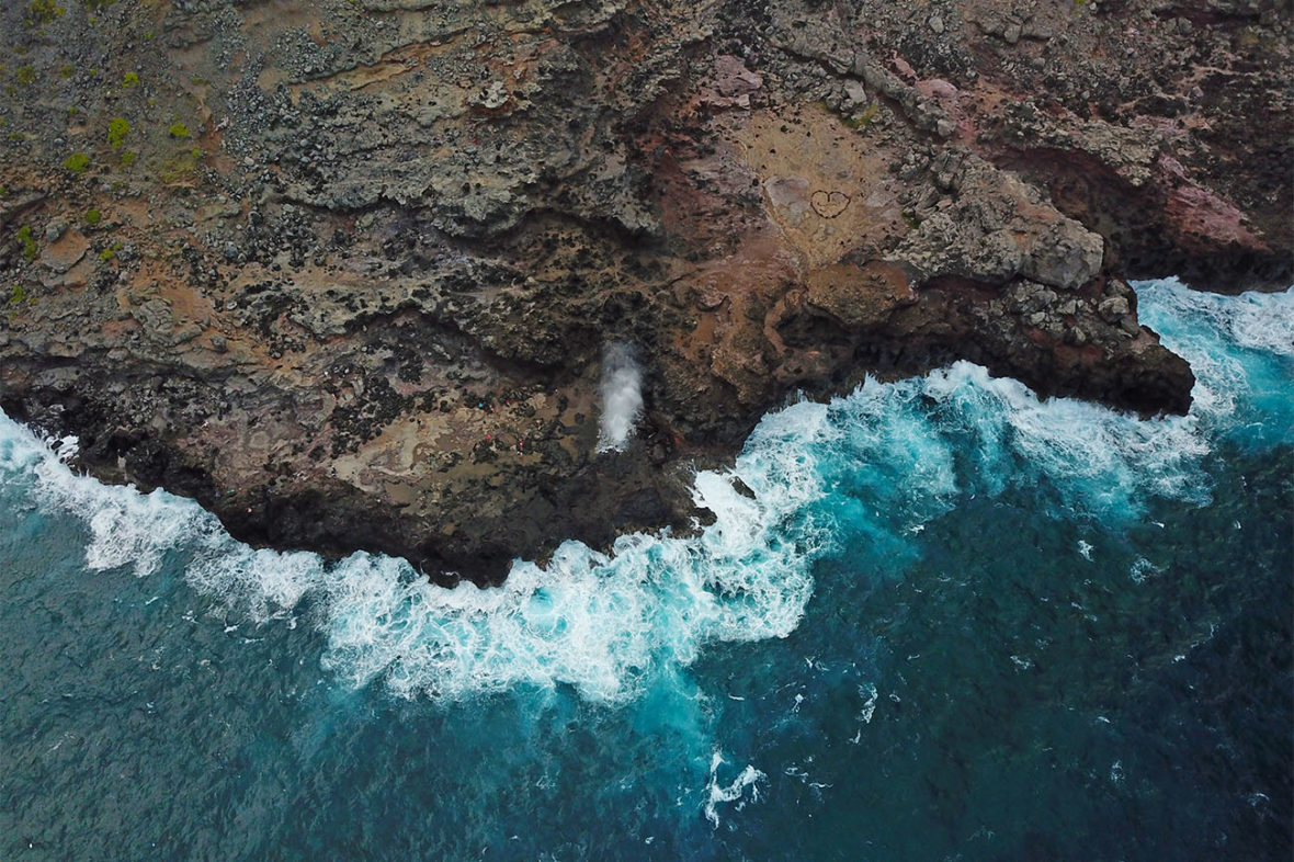 Drone photo of the Blowhole on the North Shore of Maui, Hawaii, on the Road to Hana in the Barefoot Buggy, Road to Hana, Maui, Hawaii, Beach, Beaches, Bay, Sunrise, Sunset, Hikes, Hiking, Hiking Hawaii, hang loose, smile, tourist attraction, ocean, nature, waves, video, footage, drone, drone video, DJI Mavic Pro, Mavic, Barefoot Buggy, GoPro, GoPro Video, GoPro Hero 6 Black, NY See You Later, New York See You Later, NYSeeYouLater, NYSeeYouLater.com, Subway Handle, NYC Subway Handle
