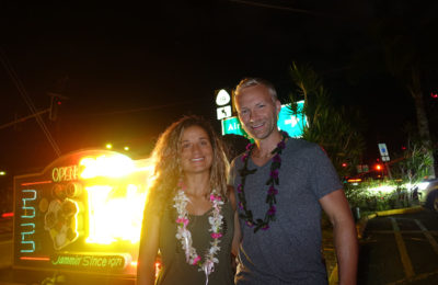 Emille and Dan by the Ken's sign on The Big Island of Hawaii