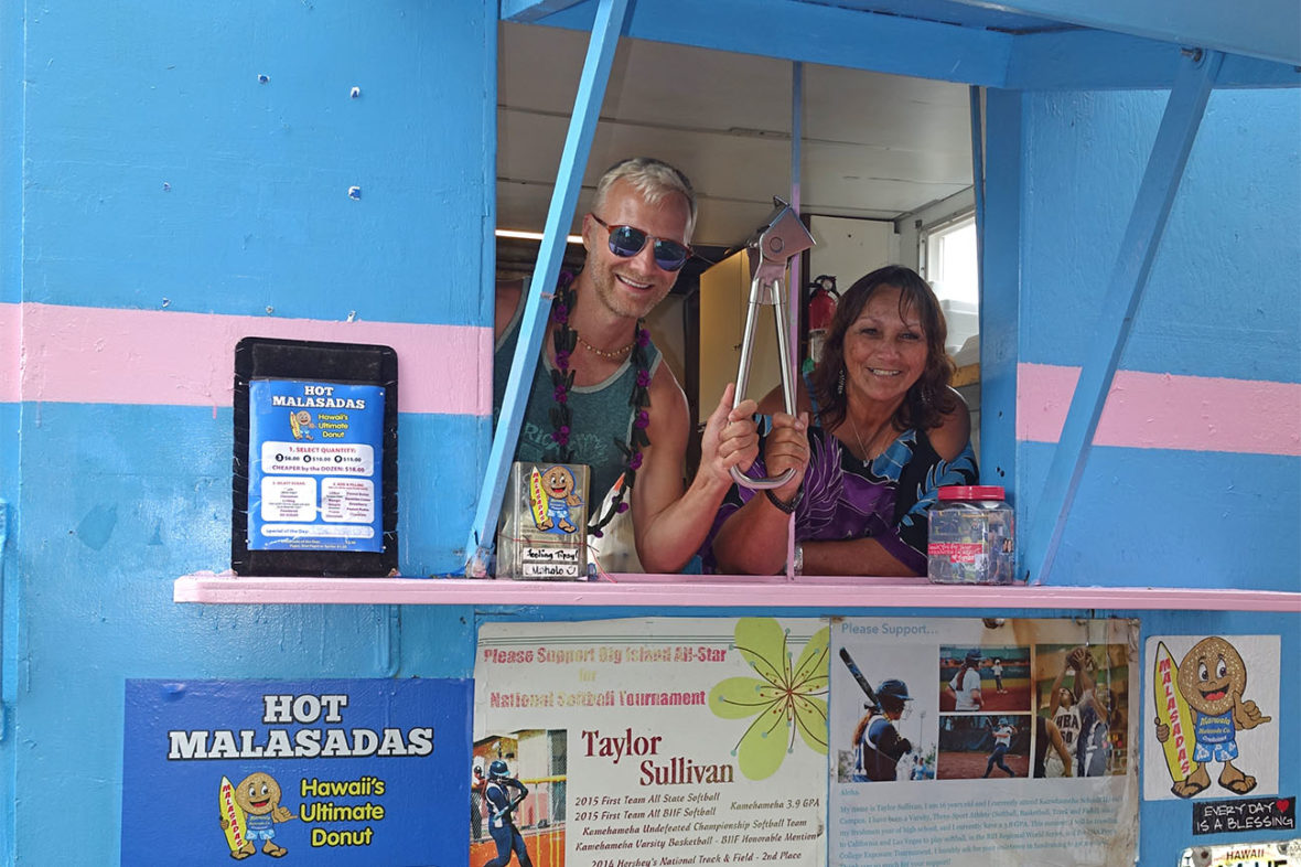 Dan holding the Subway Handle with the owner in the Hot Malasadas Truck on The Big Island of Hawaii